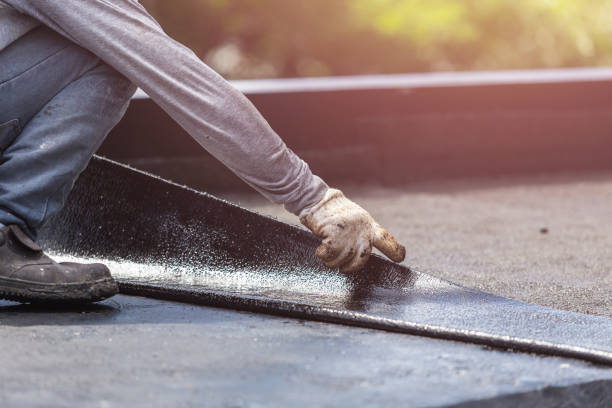 Professional Emergency Waterproofing technician working in Winona Lake, IN